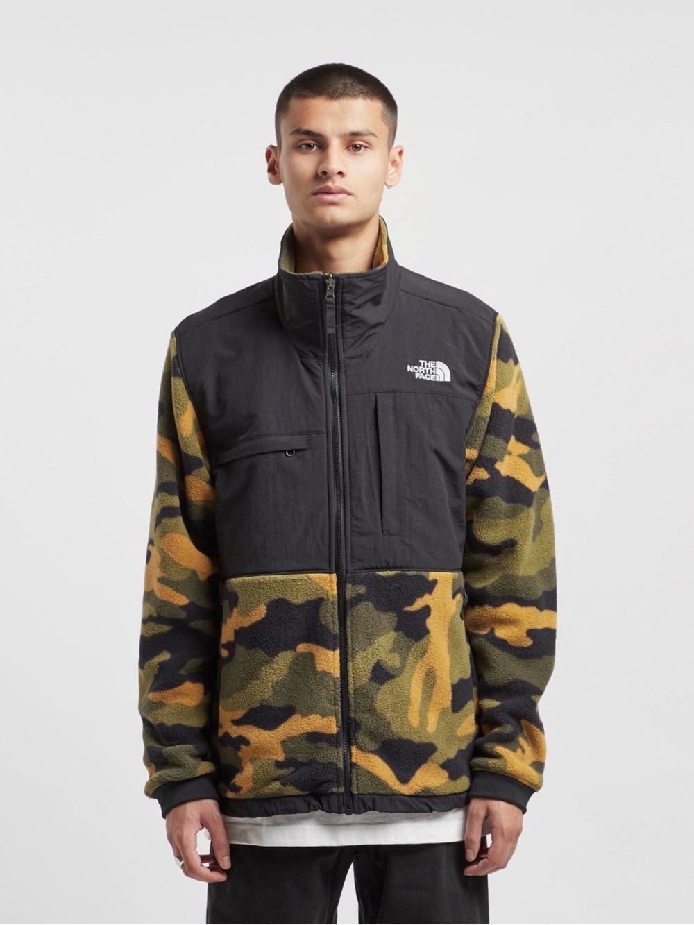 Men’s The North Face Denali-style fleece jacket in a bold black + woodland camo